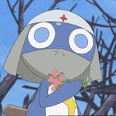 dororo de sargento keroro con unas flores rosas. es un alienígena de color azul